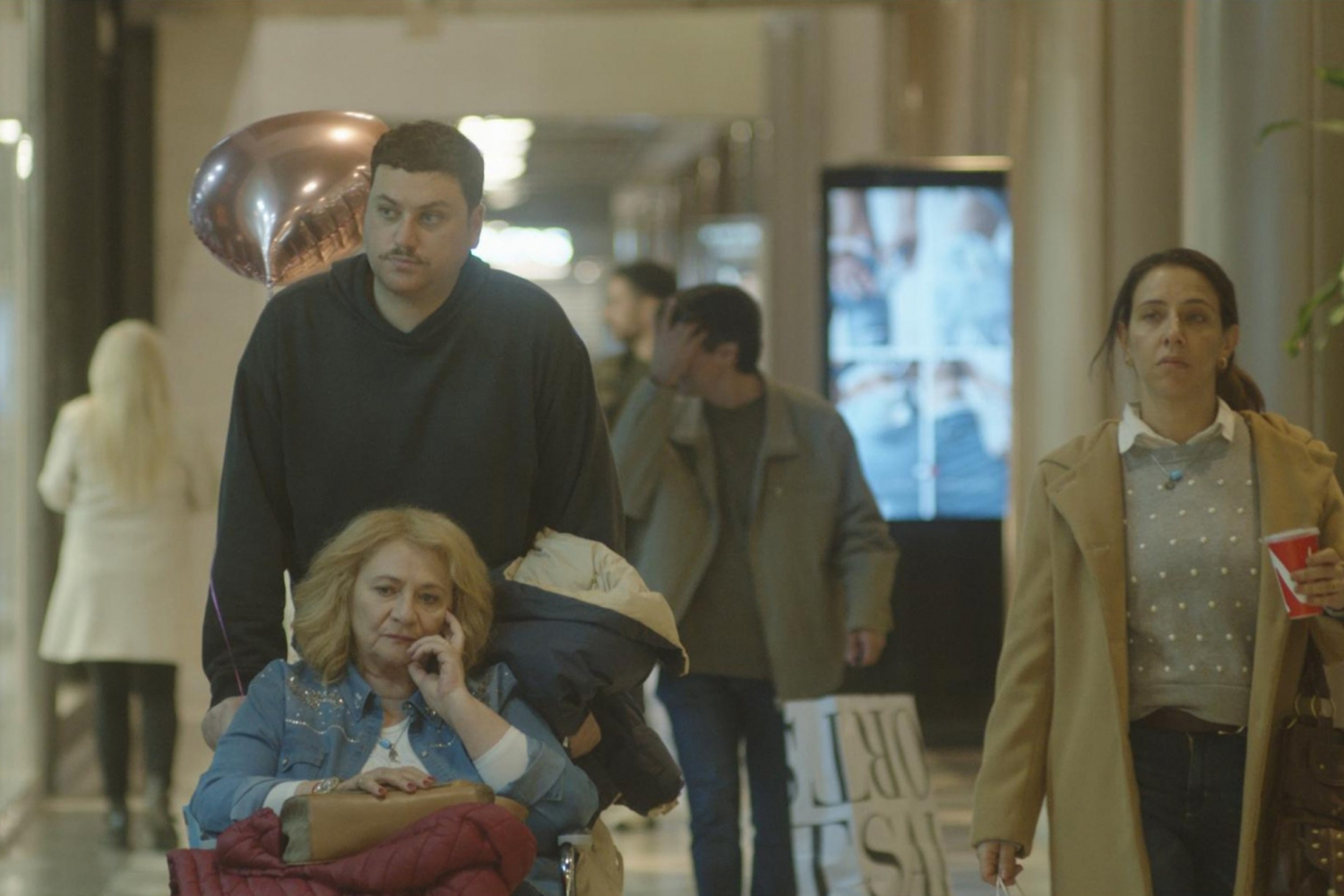 Iair Said as David, Rita Cortese as Dora and Juliana Gattas as Elisa in a scene from