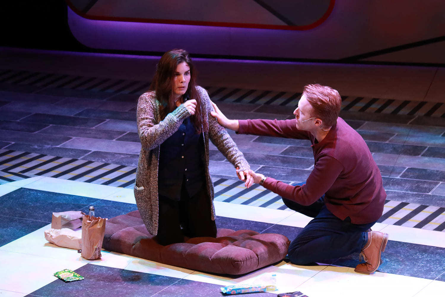 Tom Watson (Iain Batchelor) tries to help a dazed Rachel Watson (Gaby Tortoledo). (Photo by Alberto Romeu)