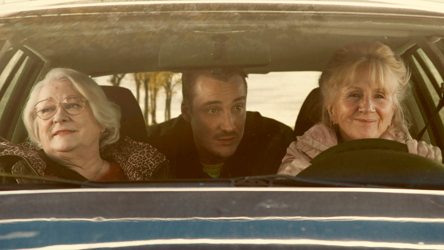 Josiane Balasko as Marie-Claude Perrin, Pierre Lottin as Vincent Perrin and Hélène Vincent as Michelle Giraud in a scene from