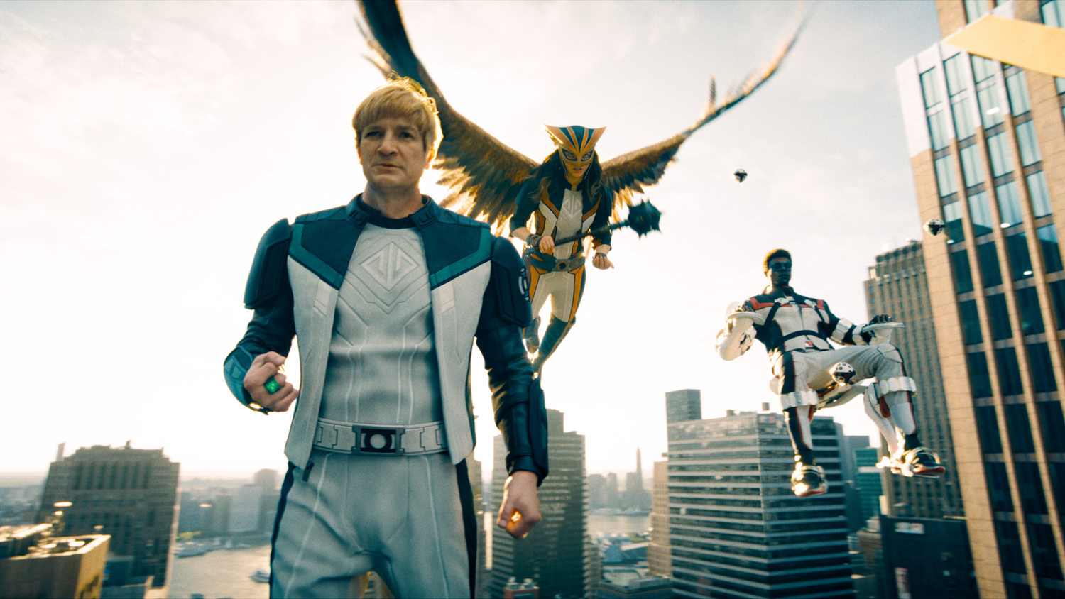 Nathan Fillion as Guy Gardner, Isabela Merced as Hawkgirl and Edi Gathegi as Mr. Terrific in a scene from