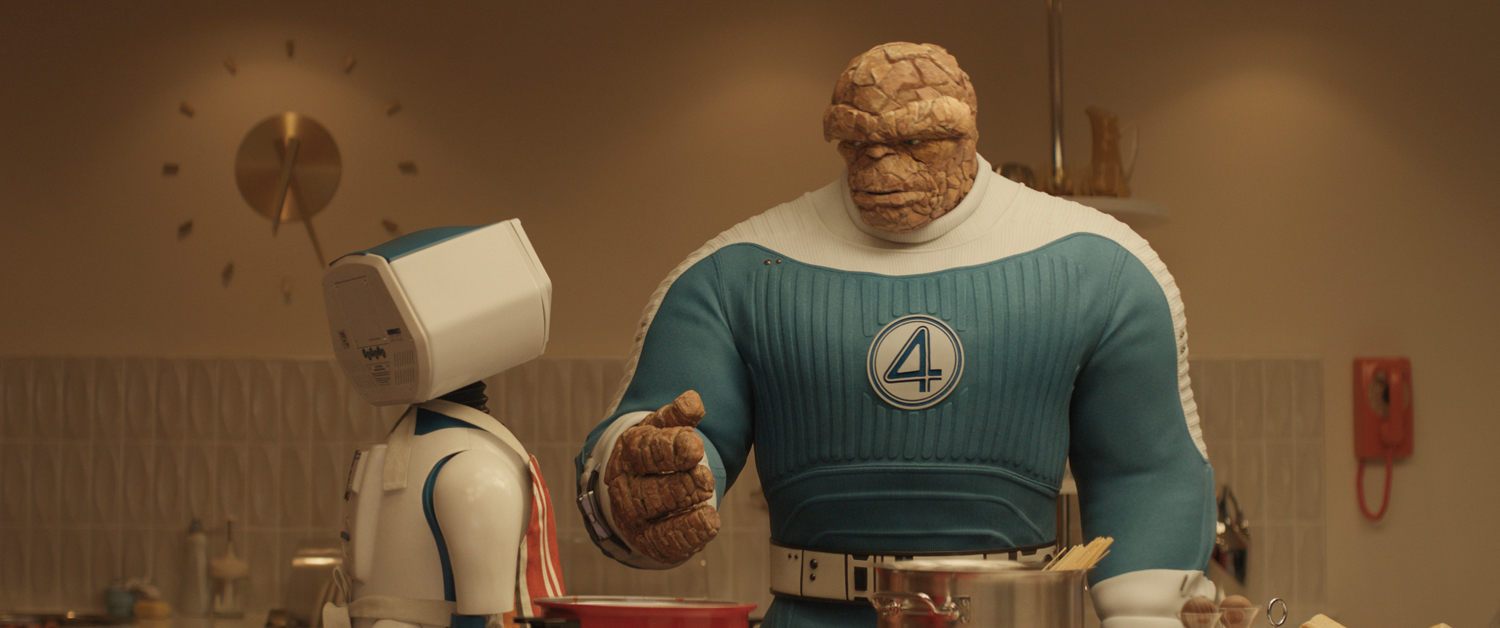 H.E.R.B.I.E and Ebon Moss-Bachrach as Ben Grimm/The Thing in a scene from 