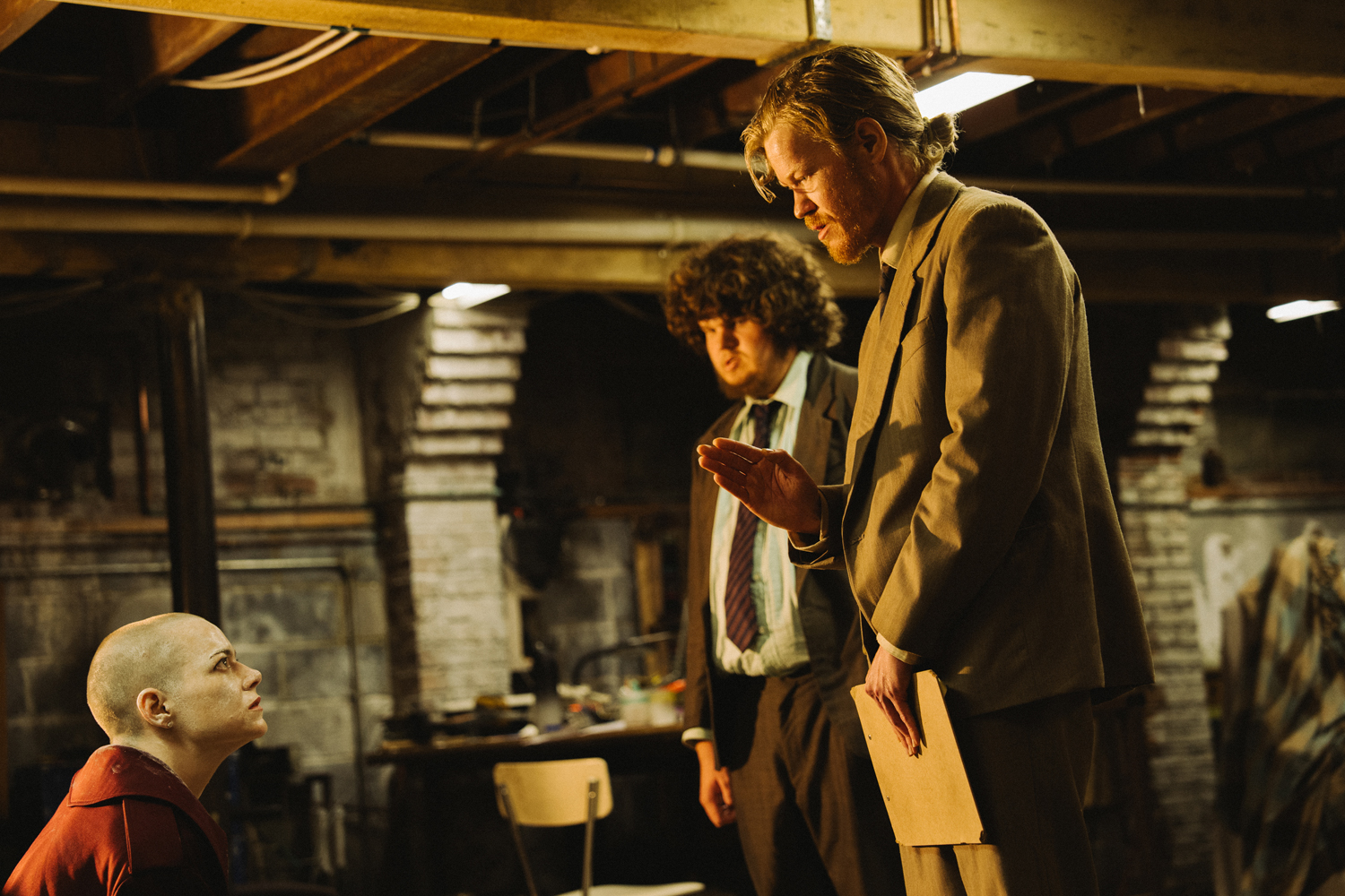 Emma Stone as Michelle Fuller, Aidan Delbis as Don and Jesse Plemons as Teddy Gatz in a scene from