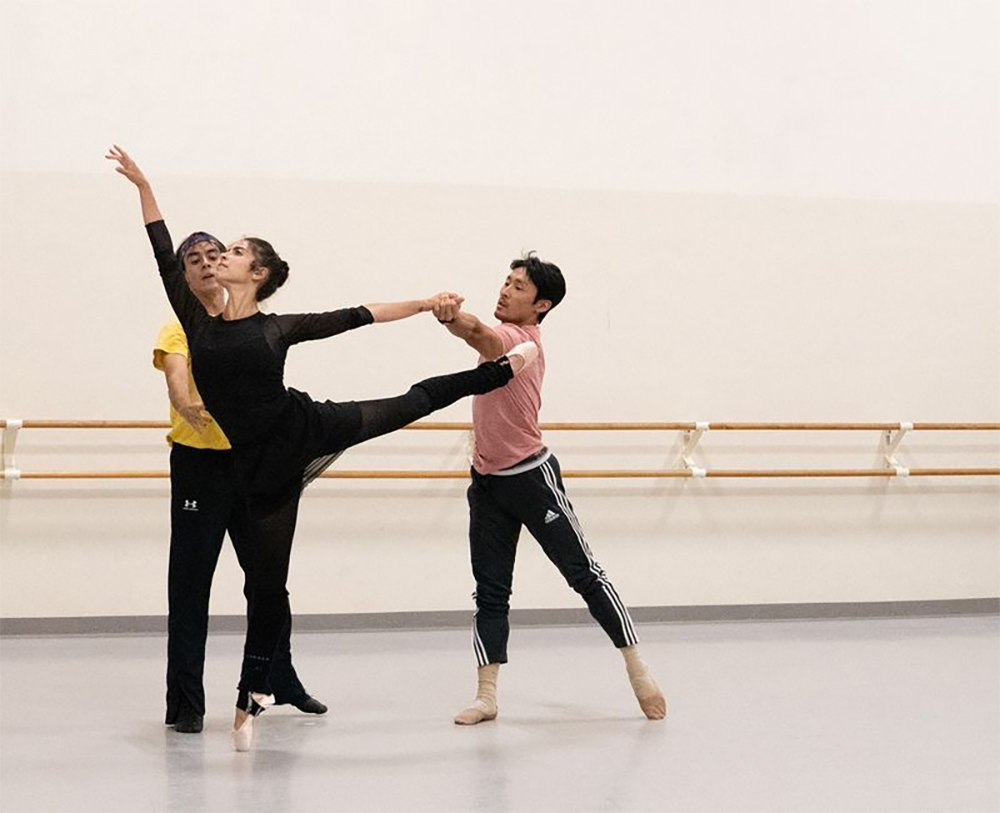 Anabel Katsnelson rehearsing an intricate pose with Guillermo Dominguez and Shimon Ito in 