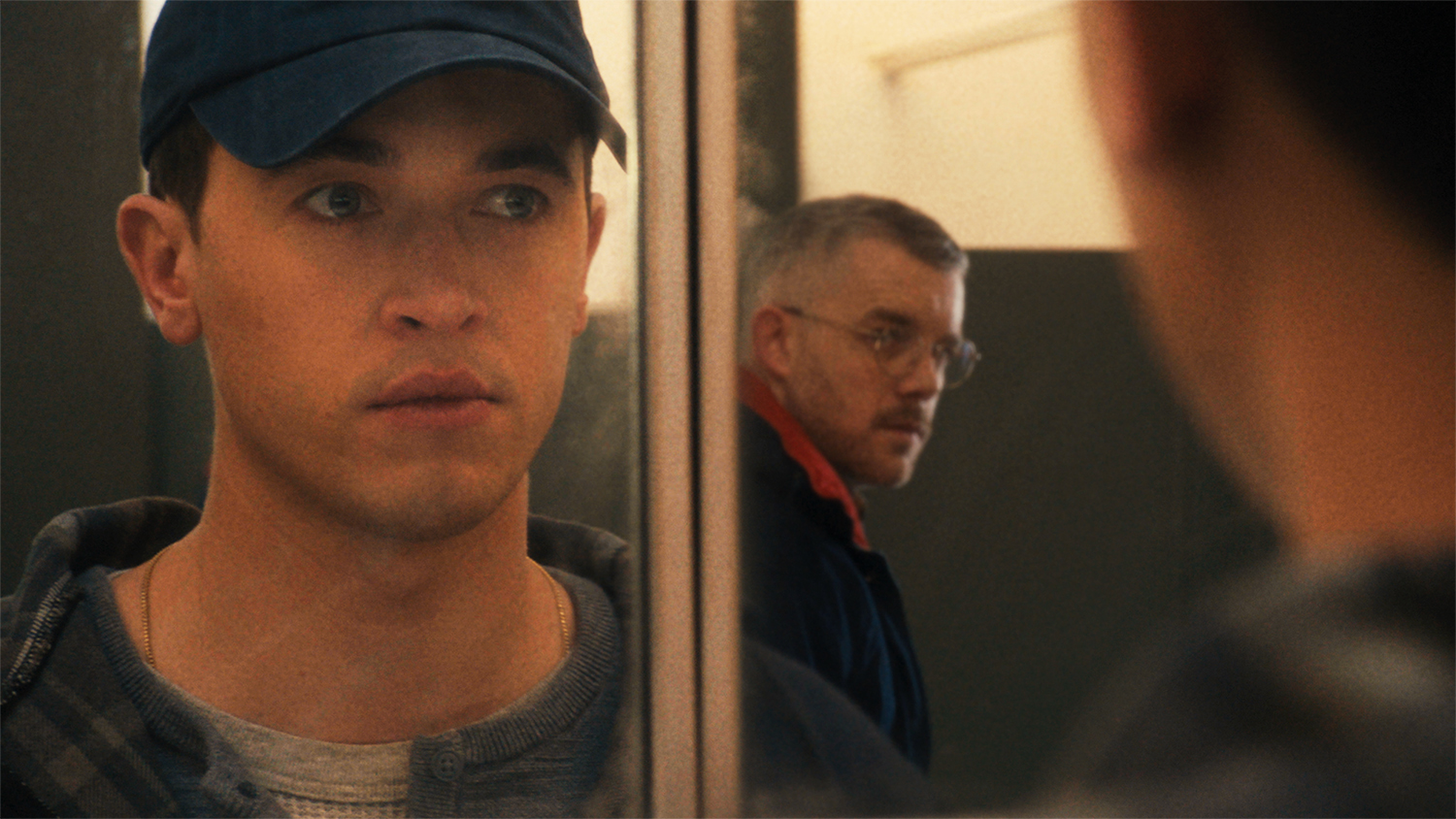 Tom Blyth as Lucas and Russell Tovey as Andrew in a scene from 