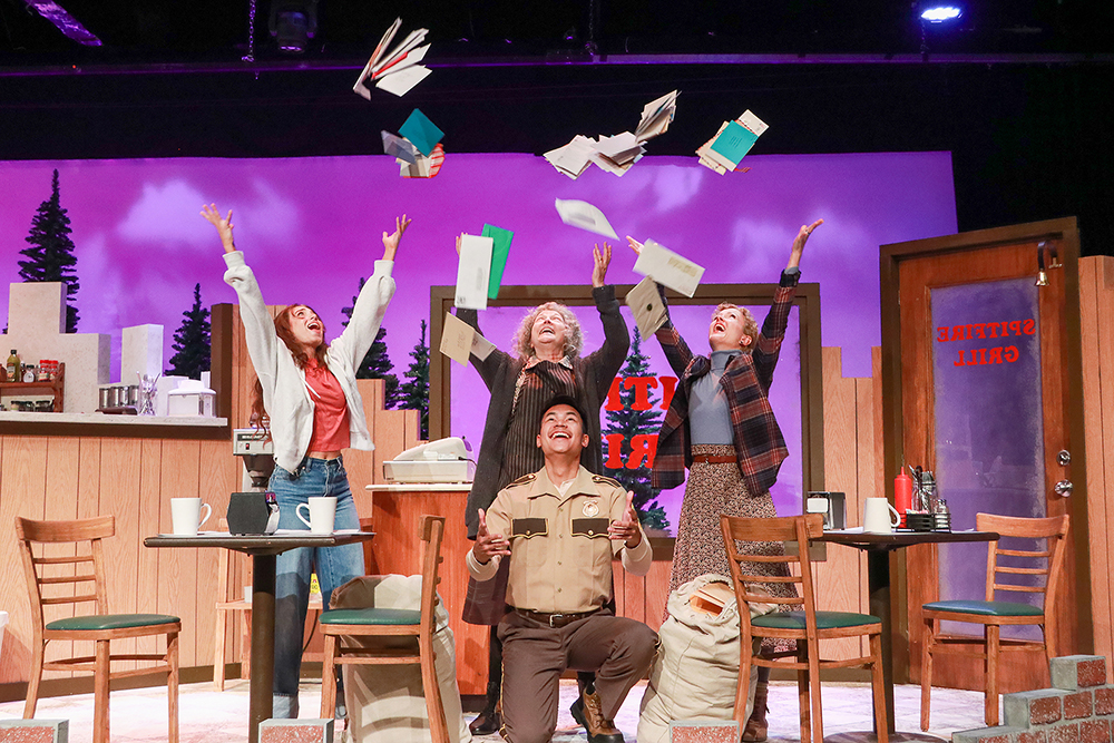 Joy suffuses the action in this scene from Actors' Playhouse's production of The Spitfire Grill. Pictured from left are Percy (Emily Van Vliet), Hannah (Laura Turnbull), Sheriff Joe Sutter (Nate Promkul), and Effy Krayneck (Kimberly Doreen Burns). (Photo by Alberto Romeu)