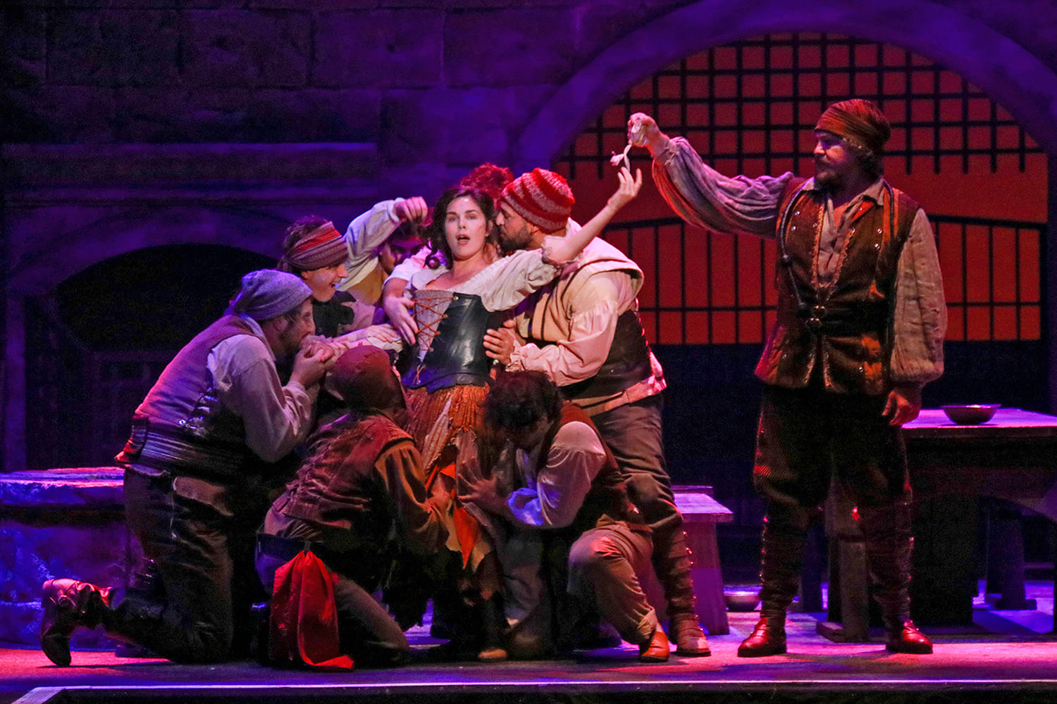 Gaby Tortoledo as Aldonza with the cast of 