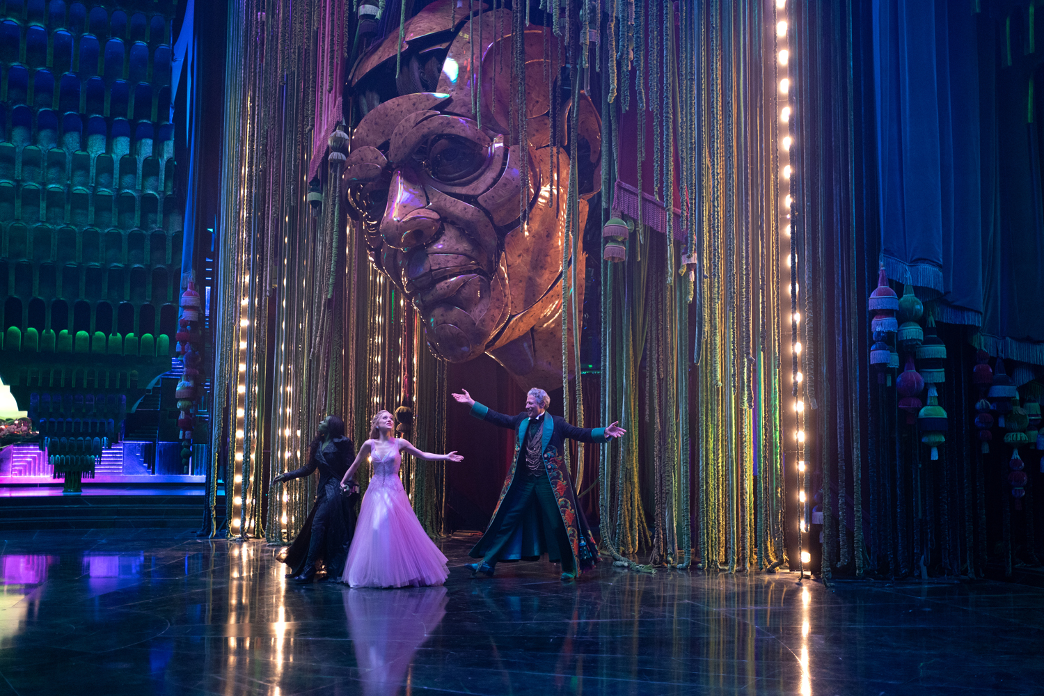 Cynthia Erivo as Elphaba, Ariana Grande as Glinda and Jeff Goldblum as The Wizard of Oz in a scene from 