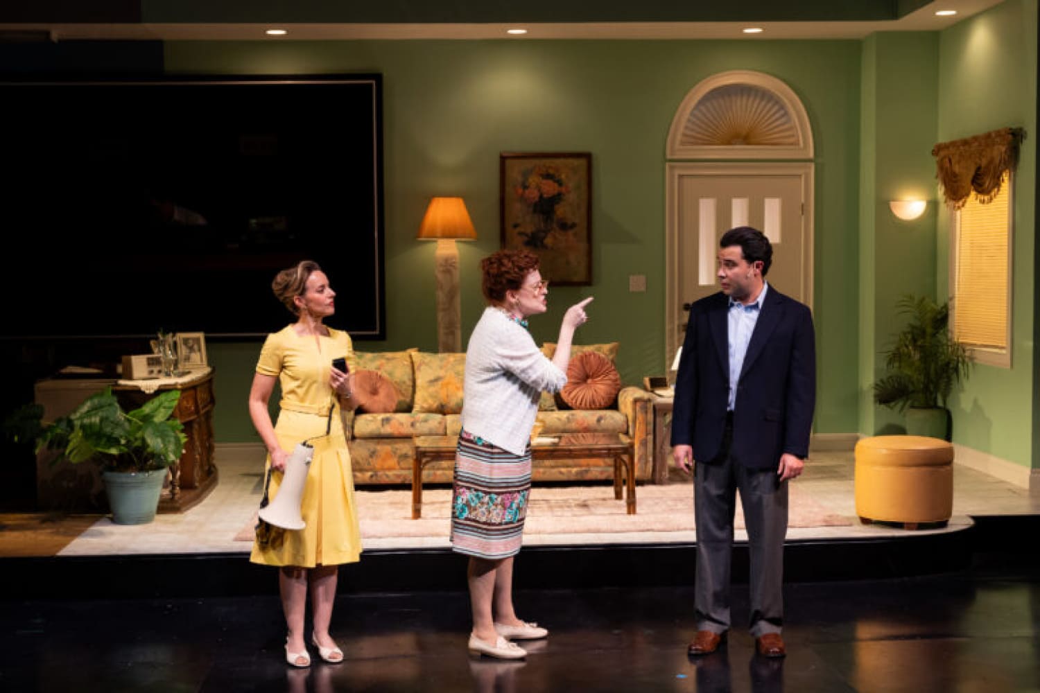 Barbara Simmons (Linda Mugleston, middle) lets Manny Diaz (Andhy Mendez) know how she feels while Emmy Shafer (Laura Faye Smith) listens.  (Photo by Morgan Sophia Photography/courtesy of Miami New Drama)