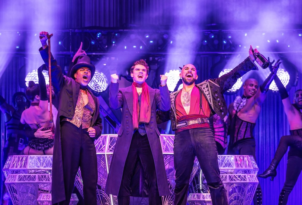Jahi Kearse, Jay Armstrong Johnson, Danny Burgos and the Company of the 2025 touring production of Moulin Rouge, playing at the Adrienne Arsht Center Tuesday, March 17 through Sunday, March. (Photo by Matthew Murphy and Evan Zimmerman)
