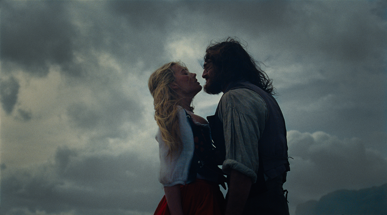 Margot Robbie as Catherine Earnshaw and Jacob Elordi as Heathcliff in a scene from 