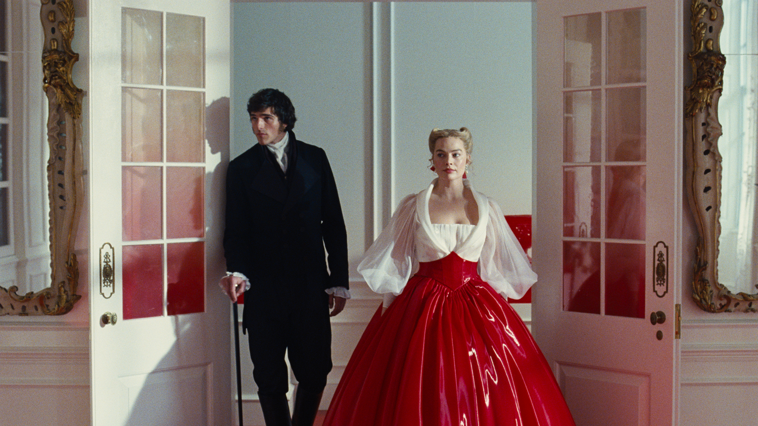 Jacob Elordi as Heathcliff and Margot Robbie as Catherine Earnshaw in a scene from 