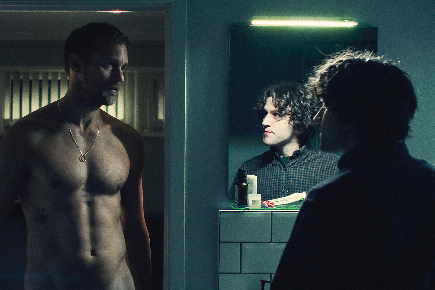 Alexander Skarsgard as Ray and Harry Melling as Colin in a scene from 