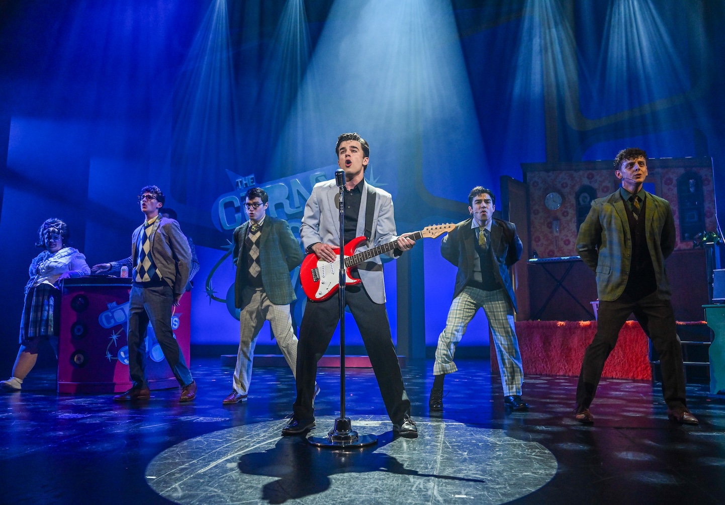 Scott Silage as Link Larkin, and Company in Slow Burn Theatre's production of 