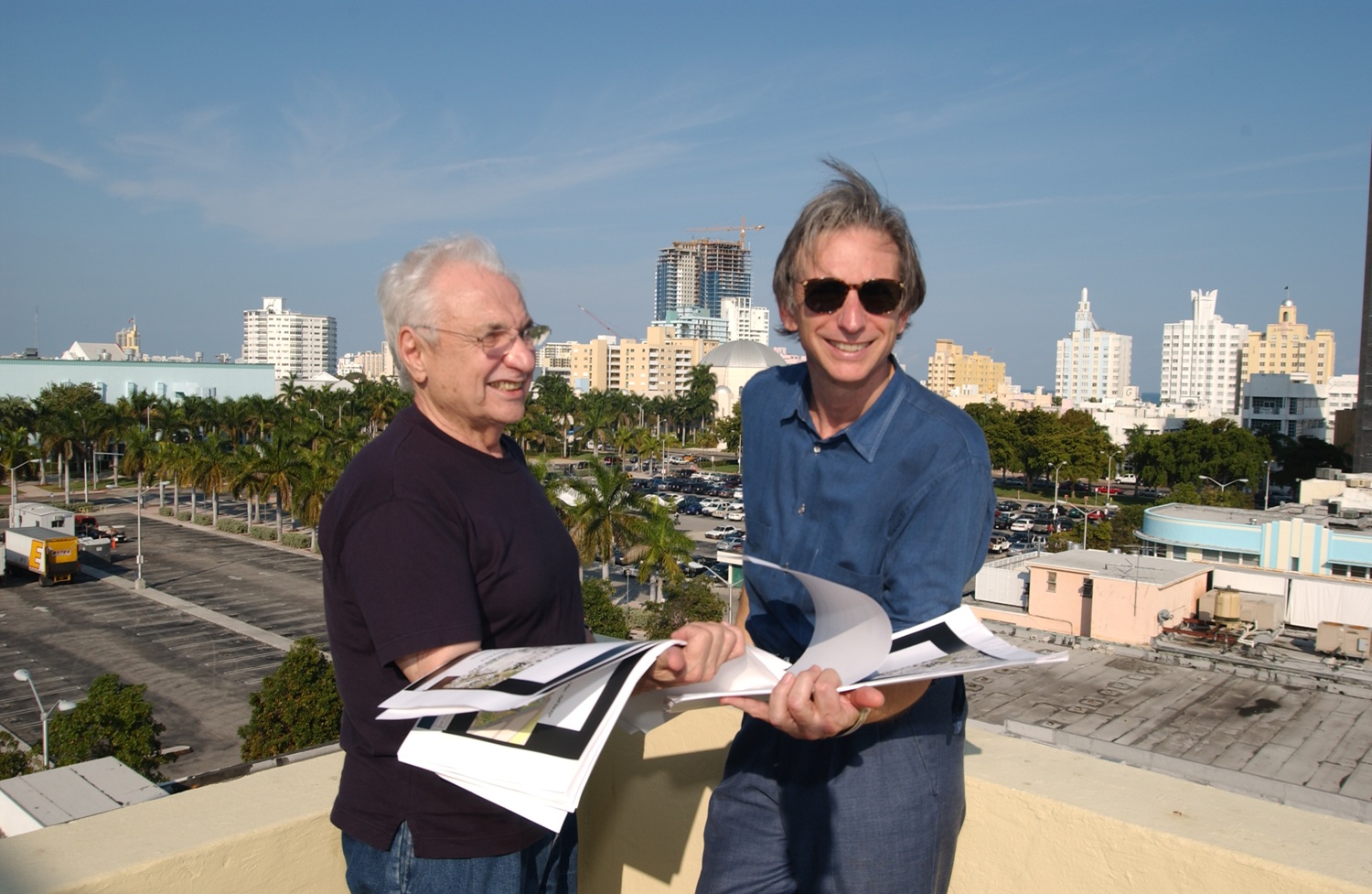 Architect Frank Gehry, left, and Michael Tilson Thomas review plans for the New World Center in 2003. (Photo by Greg Hark)