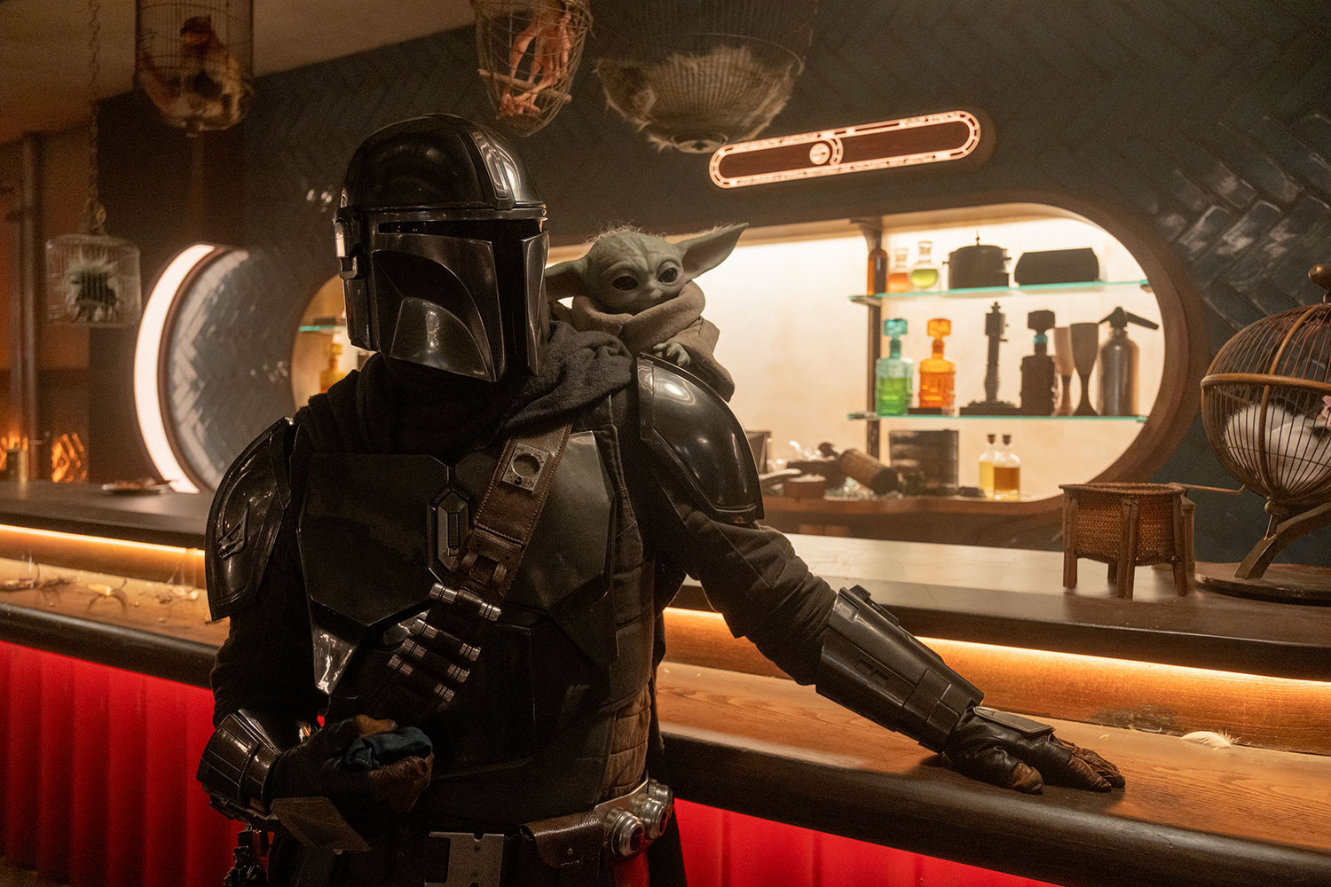 Pedro Pascal as Din Djarin/The Mandalorian and Grogu, voice designed by David Acord, in a scene from 