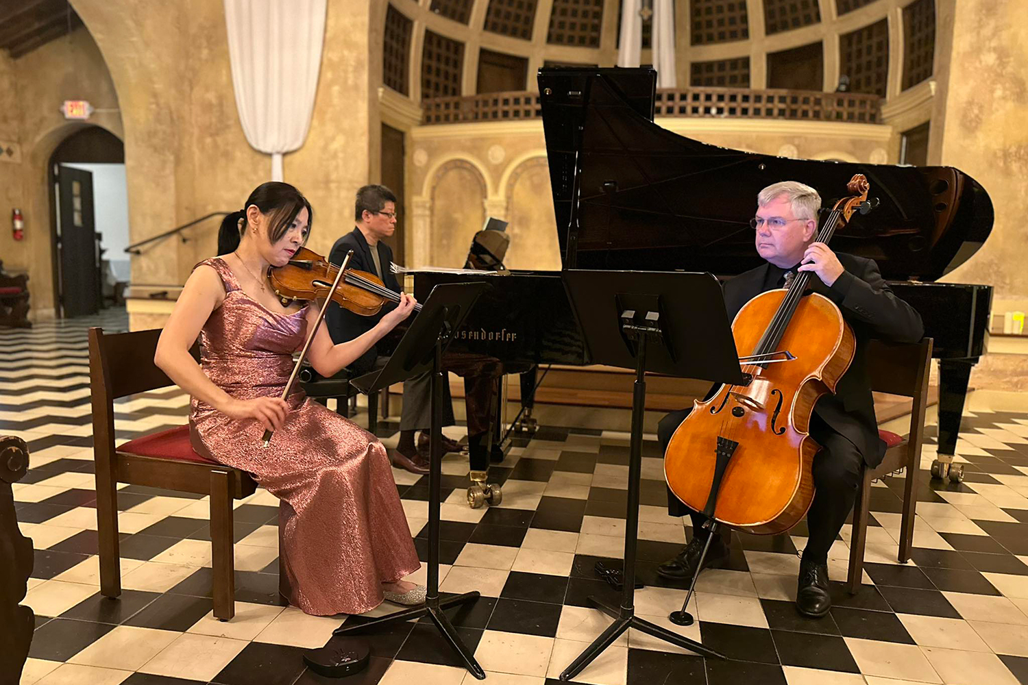 From left to right:  Violinist Huifang Chen, pianist Tao Lin and cellist Christopher Glansdorf. Chen and Glaansdorf will perform in SFSO “Summer With The Symphony” Chamber Music concert “Sparkle And Charm” on Thursday, June 25 in Coral Gables and Friday, June 26 in Ft. Lauderdale (Photo Courtesy of  Catherine Lan)