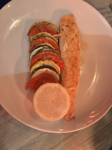 Beautifully plated grilled salmon.