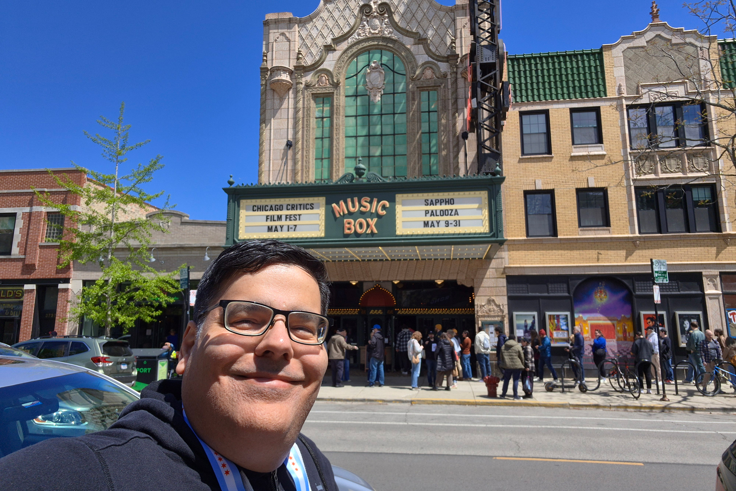 Ruben Rosario, miamiartzine.com movie critic, poses in front of the iconic Music Box Theatre during the 13th Chicago Critics Film Festival.