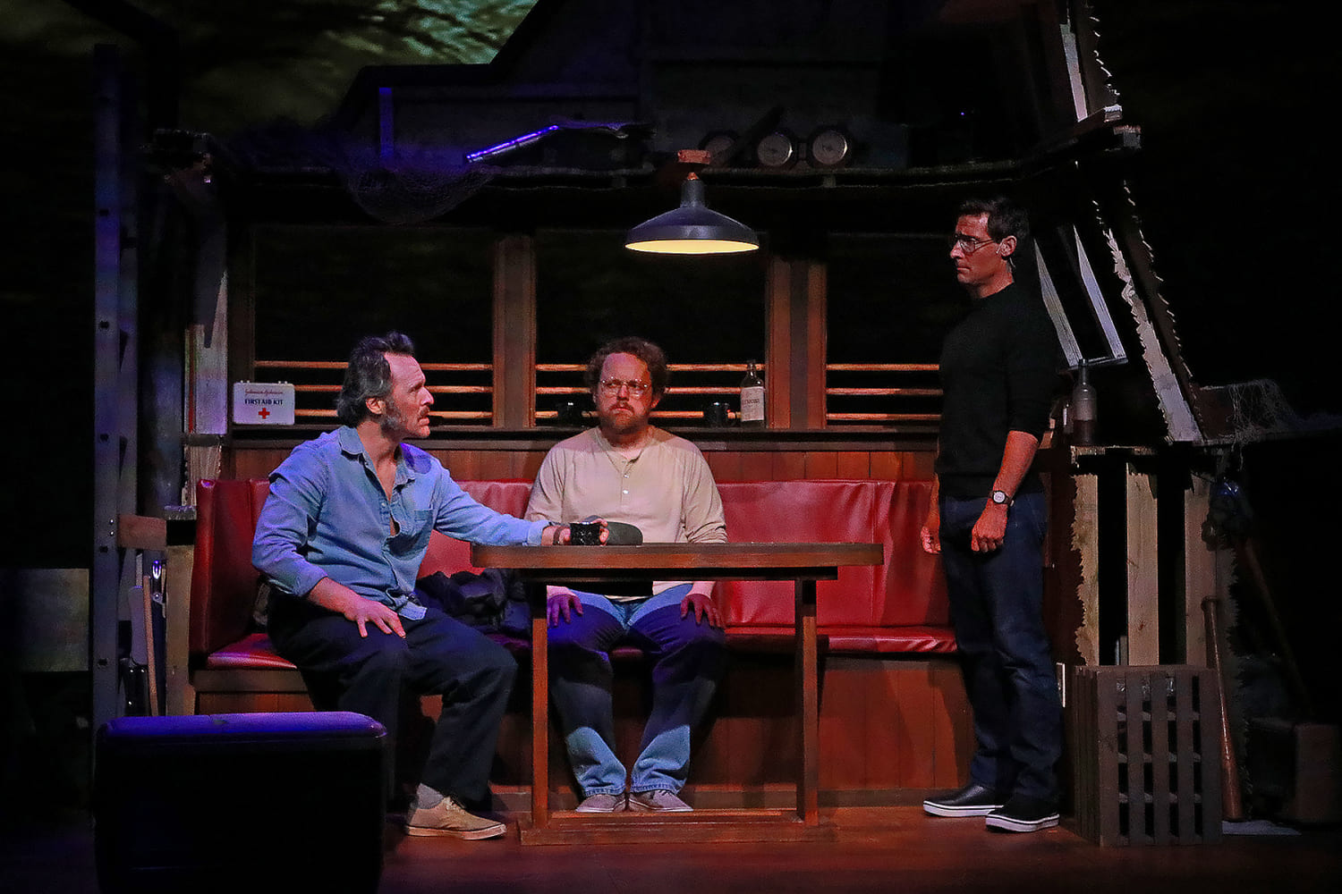 Iain Batchelor as Robert Shaw, Wesley Slade as Richard Dreyfuss, and Adam Poole as Roy Scheider in Actors' Playhouse's production of 