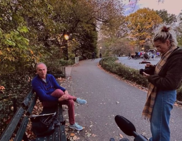 Filmmaker Oana Martisca works with a subject during filming of 