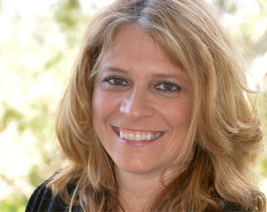 Miamiartzine editor and theater critic Michelle F. Solomon will receive The Charlie Cinnamon Award at this year's Carbonell Awards for outstanding support of theater and support of the Carbonell Awards. (Photo courtesy of Artburst Miami)
