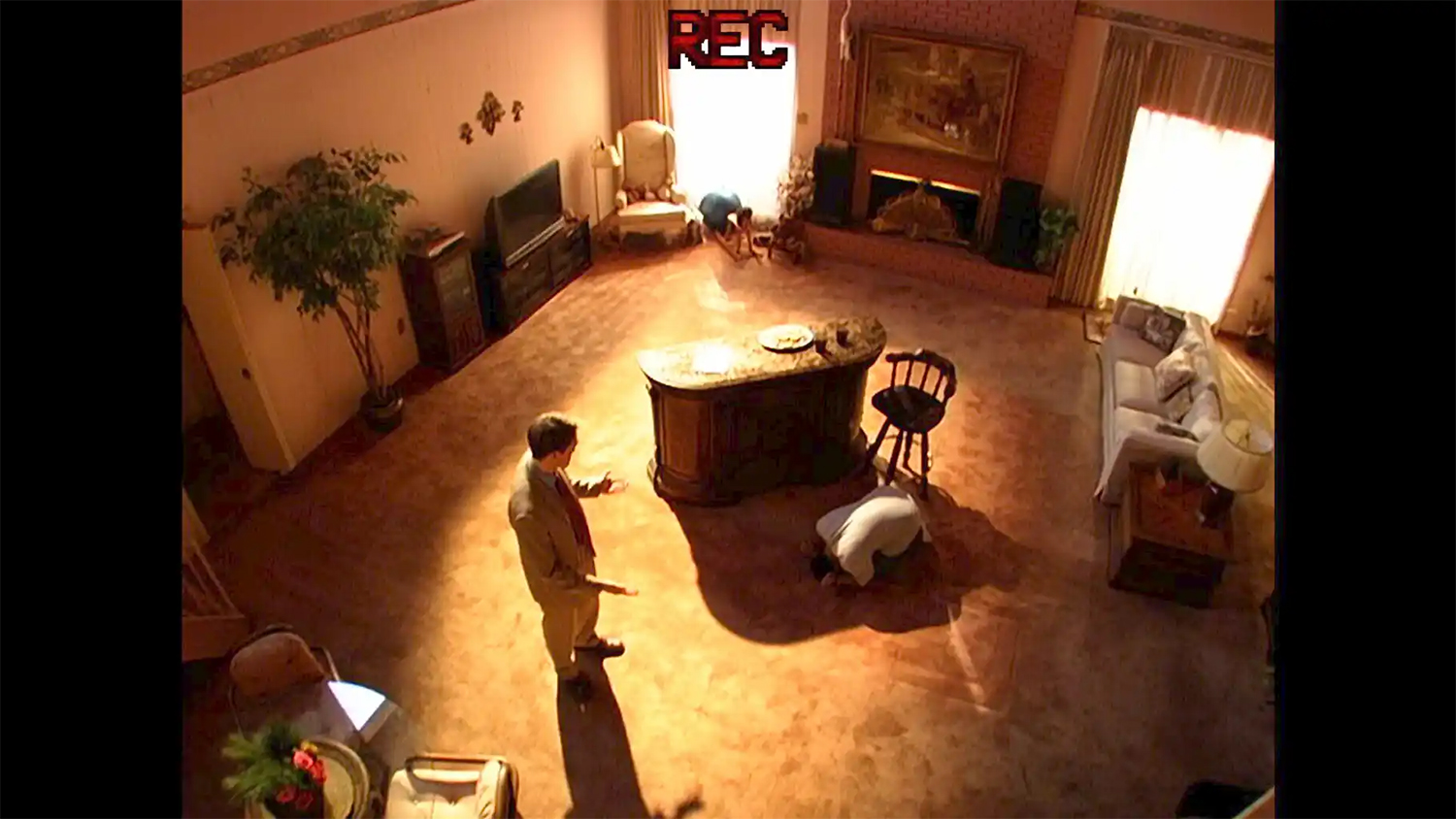 Robert Pattinson as Chris Hansen and Tony Revolori as MarriedAndLookingForFun31313 in a scene from 