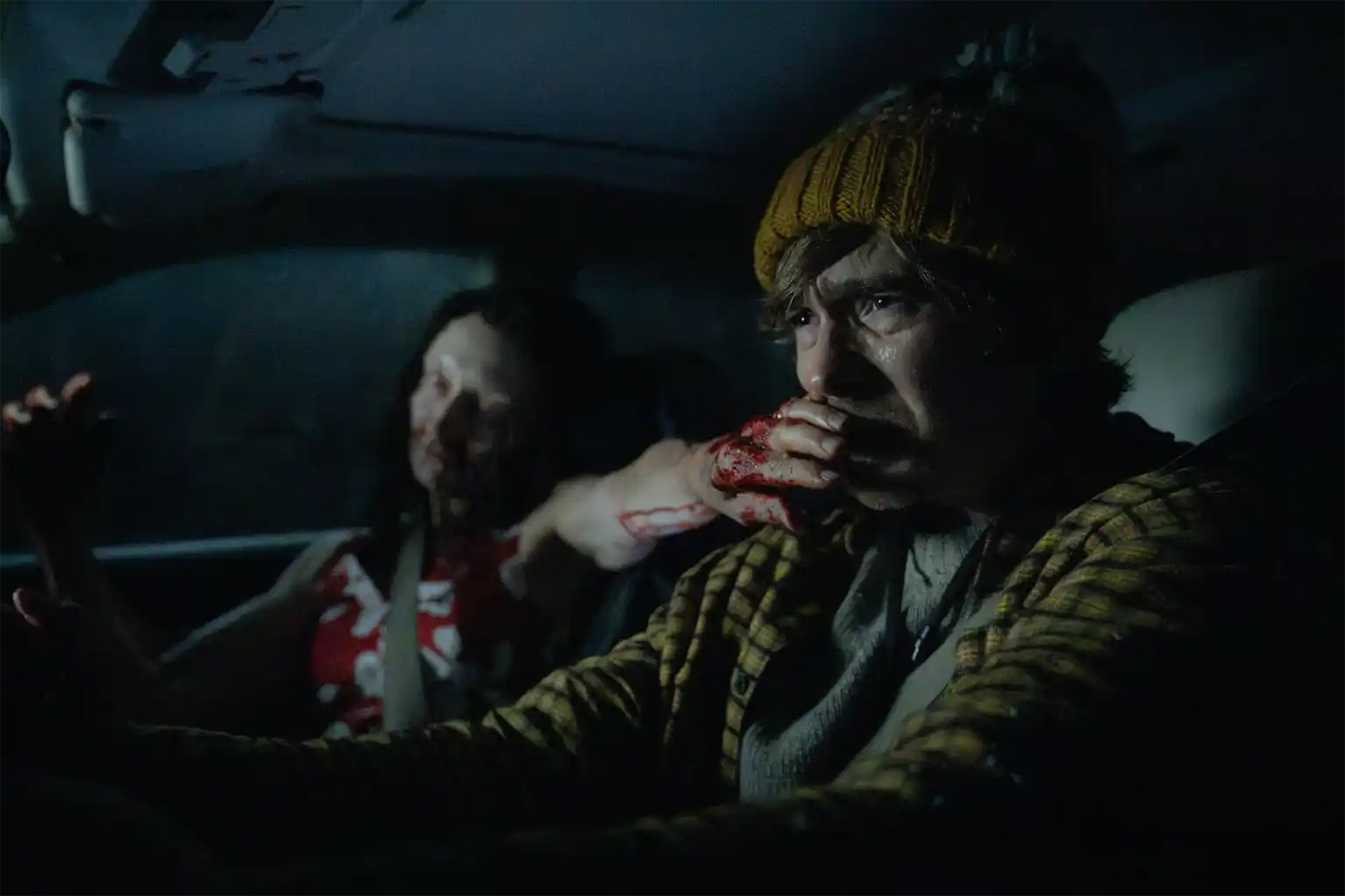 Andrea Miltnerova as Pedestrian and Austin Abrams as Bryan Hodukavich in a scene from 