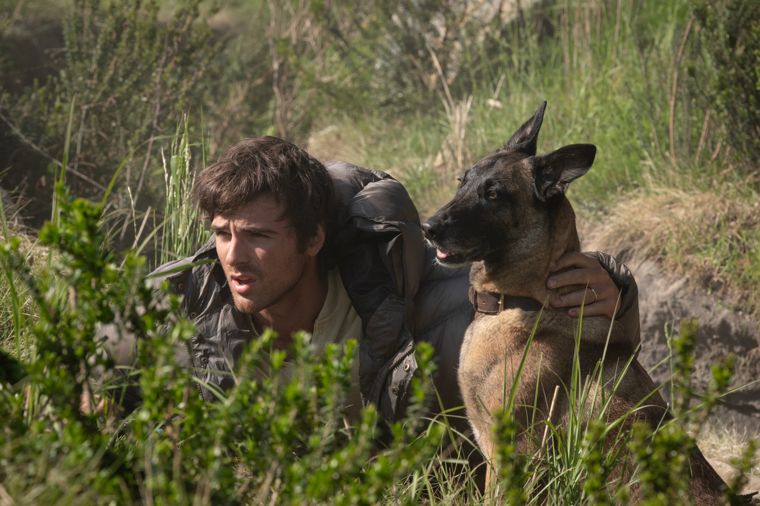 Jacob Elordi as Hig and Raksha as Jasper in a scene from 