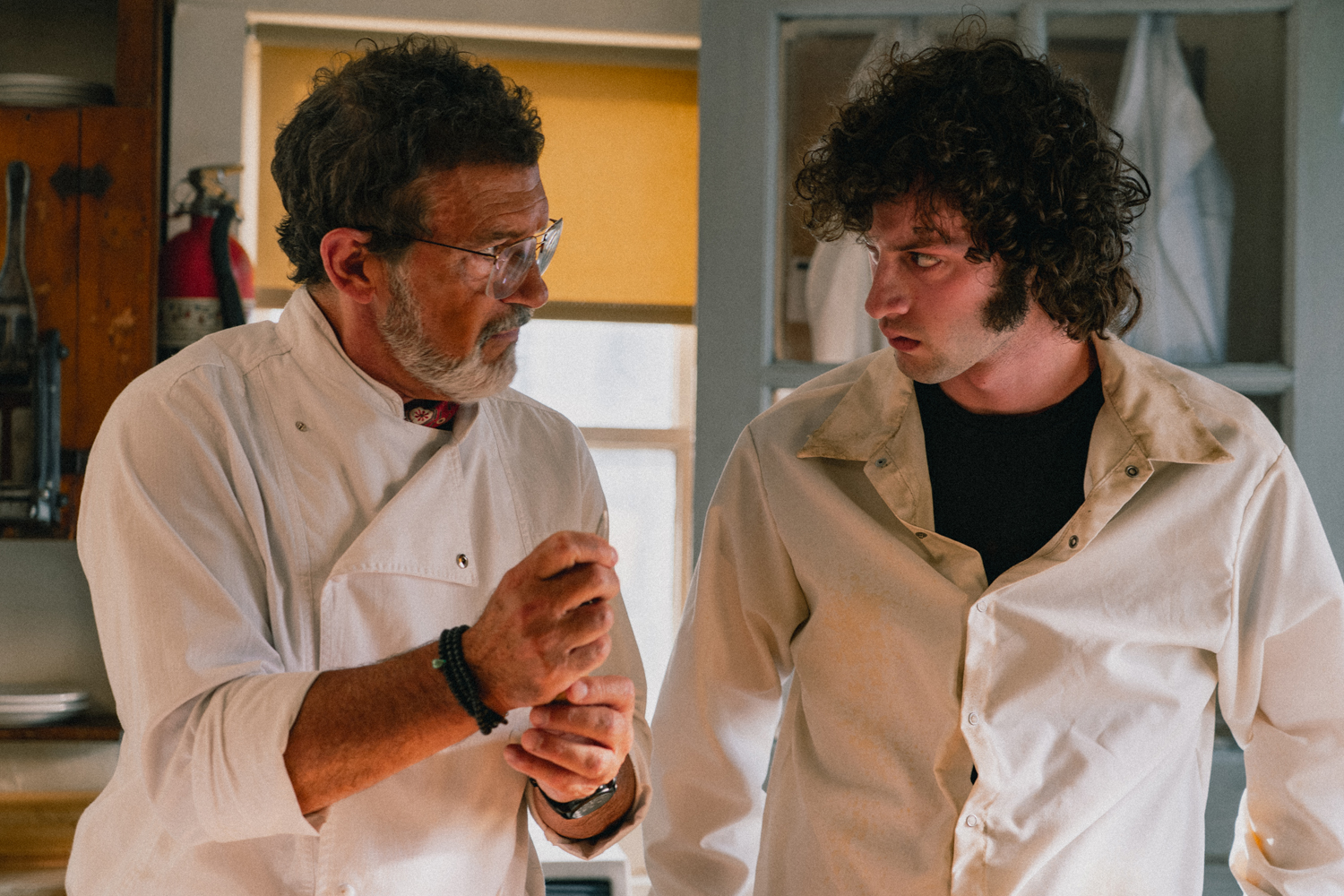 Antonio Banderas as Chef Jose Vatel and Dominic Sessa as Anthony Bourdain in a scene from 