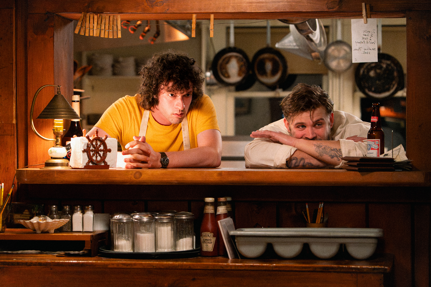 Dominic Sessa as Anthony Bourdain and Leo Woodall as Sal in a scene from 