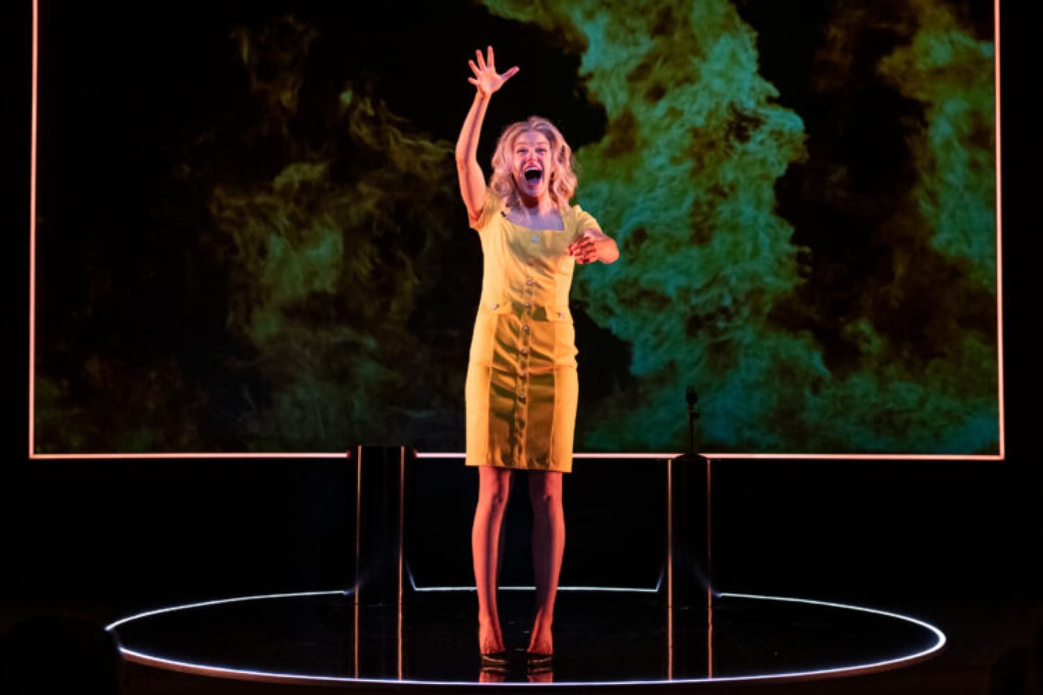 Reporting live from Fresno! Ella Olesen stars as a California weather girl who struggles to deliver forecasts about our climate-stricken planet with unflinching optimism. (Photo by Magnus Stark, courtesy of GableStage)