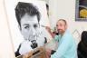 Artist Tony Chimento graciously poses in his studio . . .