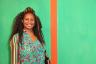 Andrea Thompson's fashion matches the artwork