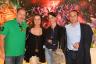 Chris and Lukas Krattiger with Roberto and Patricia Hayer next to James Rosenquist's "Television or the Cat's Craddle"