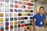 Artist Kaiser Suidan next to his "117 Cubes Installation"
