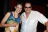 Tito Puente, Jr. graciously poses with Michelle Boutselis . . .