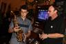 Young musician checks out Kenny G sax.
