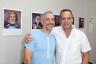 Cal's Barber Shop proprietor Cal Tkach with artist photographer Robert Figueroa-Peggs.