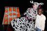City Theatre's Prodigal Cow poses with Taylor Moxey.