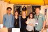 Standup comedian, actor and MDC faculty professor Freddy Stebbins (left) poses with Jai-Alai Books team.