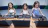 Future DJs trying out the spin table