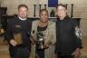 Ancient Spanish Monastery Chairman/Curator Greg Mansfield, Ancient Spanish Monastery President Janie Greenleaf and MC George Neary