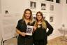 Broward Center for the Preforming Arts Sales & Marketing Manager Maria Fulfaro and ArtServe Curator Sophie Bonet in front of Fernanda do Valle's “Free Yourself” photography project.