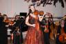 Lara St. John performing with female members of the South Florida Symphony