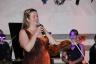 Violinist Lara St. John addressing the audience