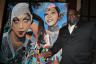 Artist Addonis Parker with his Josephine Baker painting, unveiled at the event.