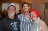 George Neary, Artist Patrick Louis, and Event Coordinator Carol Coombes.