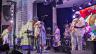 Junkyard Band performs.
